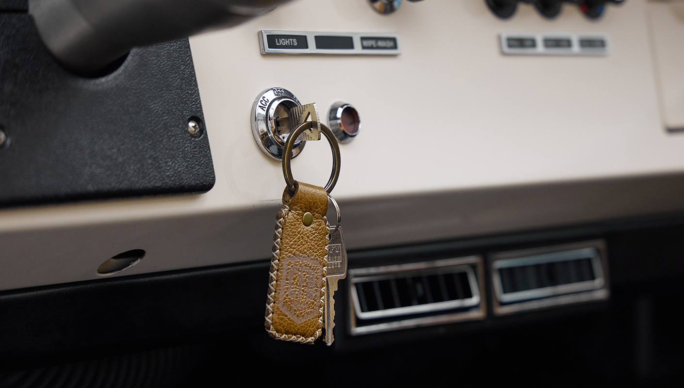 1973 Ford Bronco in Brittany Blue over Whiskey leather key