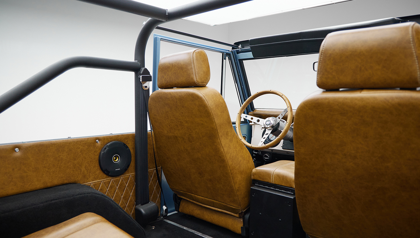 1973 Ford Bronco in Brittany Blue over Whiskey leather interior detail