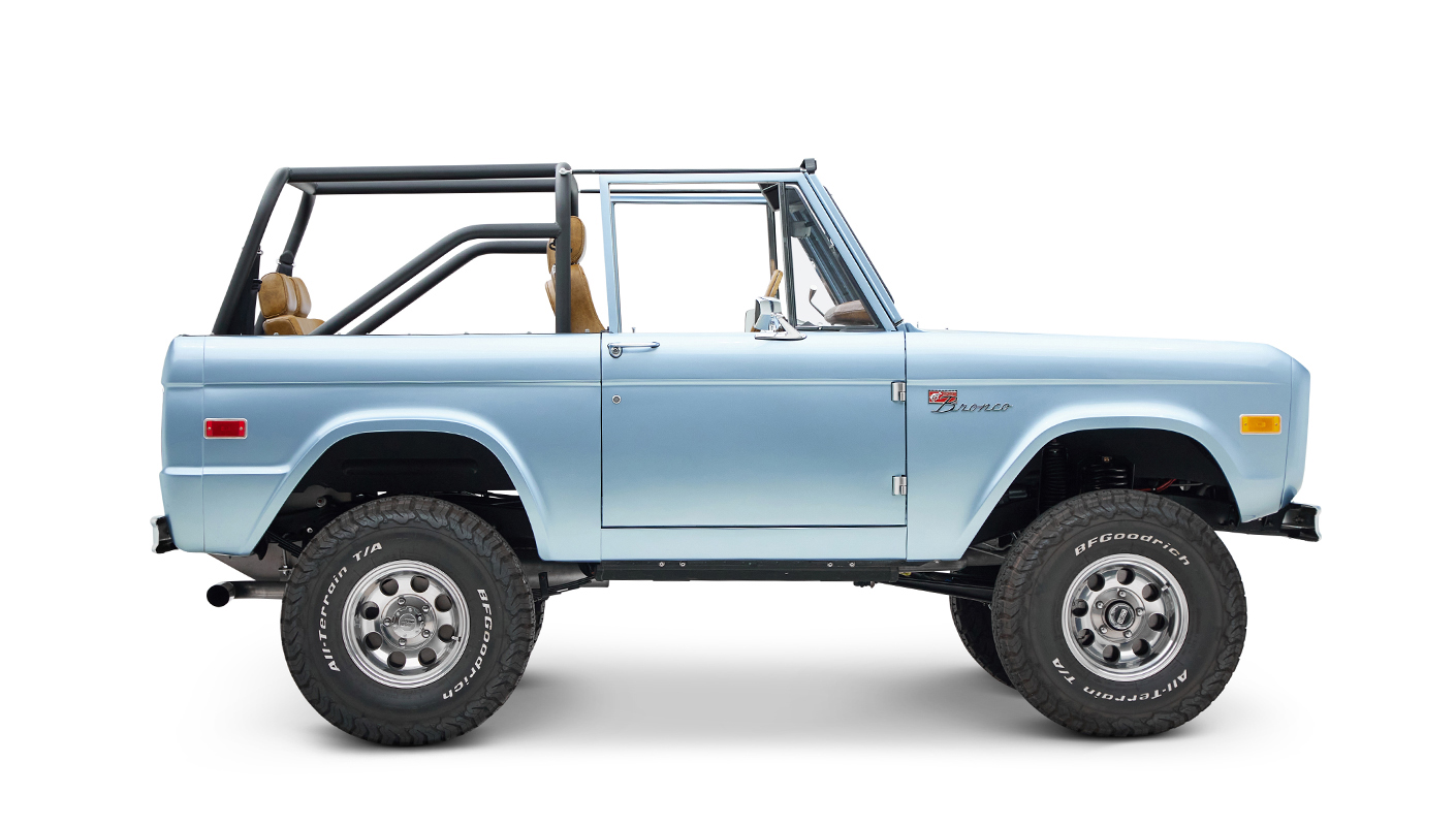 1973 Ford Bronco in Brittany Blue over Whiskey leather passenger profile