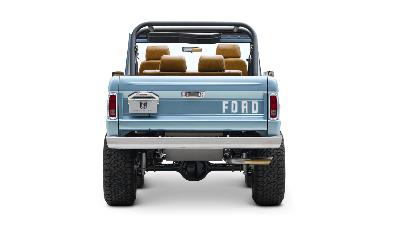1973 Ford Bronco in Brittany Blue over Whiskey leather rear