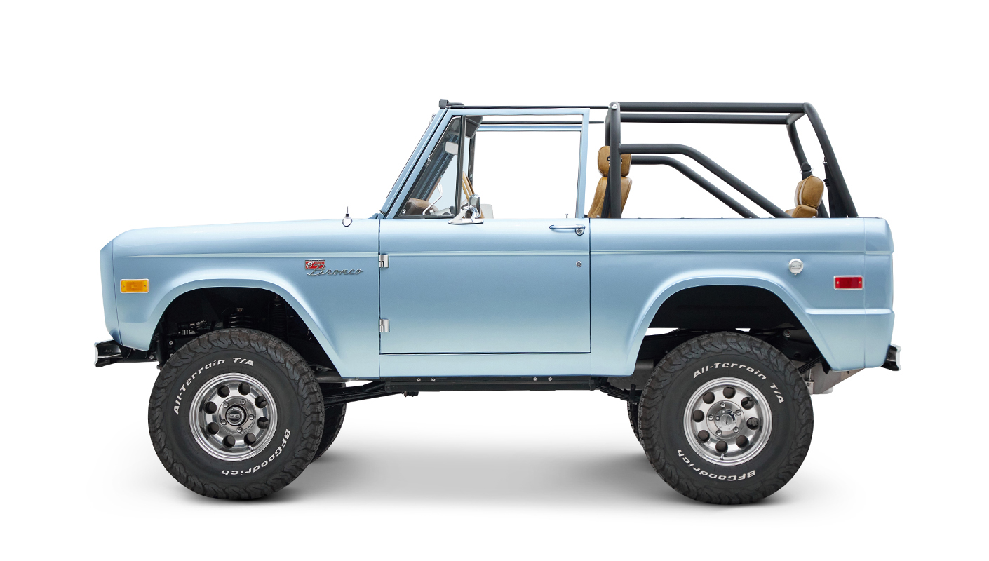 1973 Ford Bronco in Brittany Blue over Whiskey leather driver profile