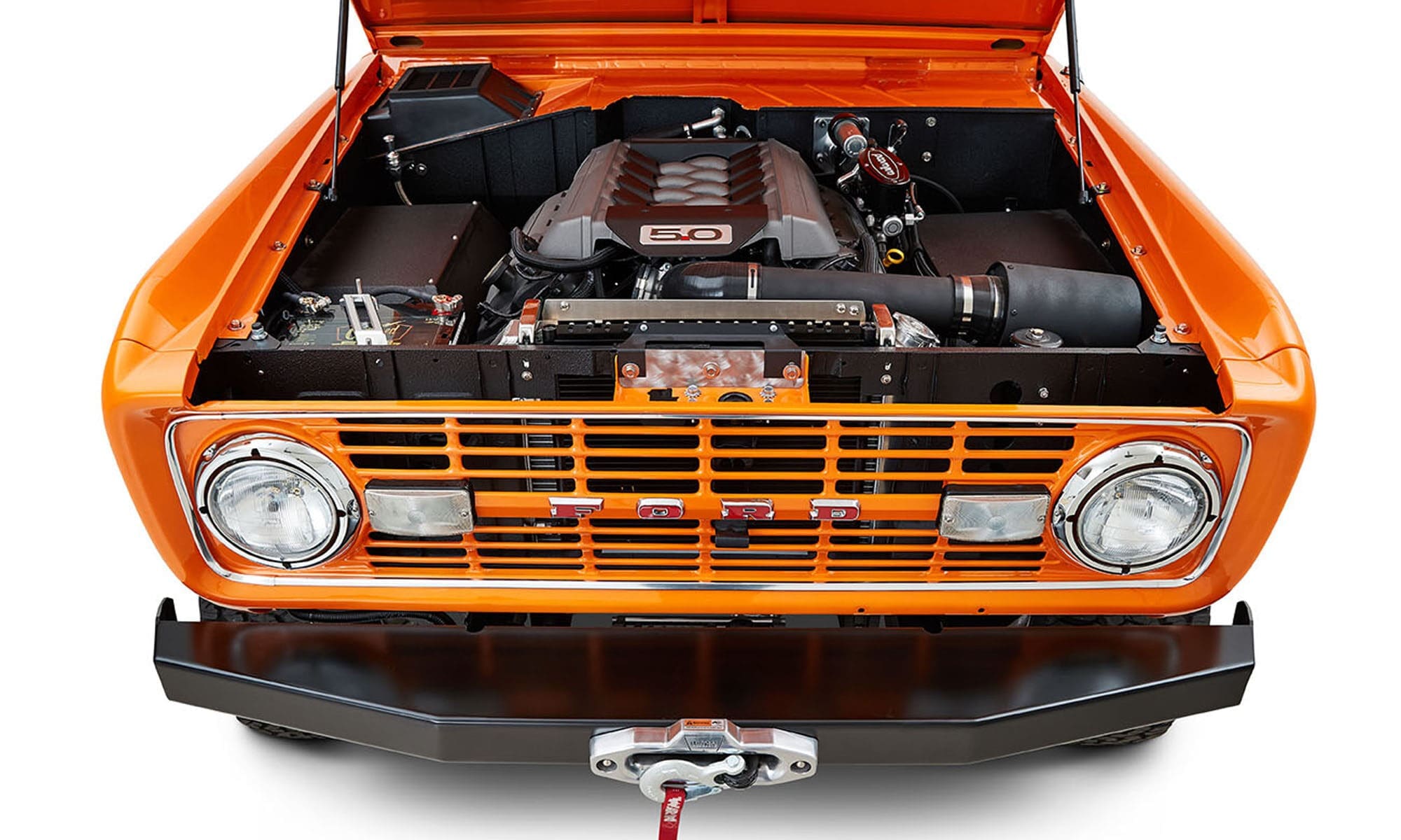 1970 Orange Classic Ford Broncos Coyote Series with white and plaid custom interior and family roll cage
