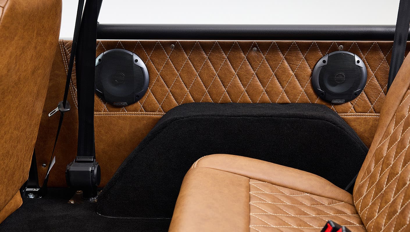 Ford Bronco 1970 in Matte Macadamia Brown with whiskey leather interior and black wheels Wooden Steering Wheel diamond stitch