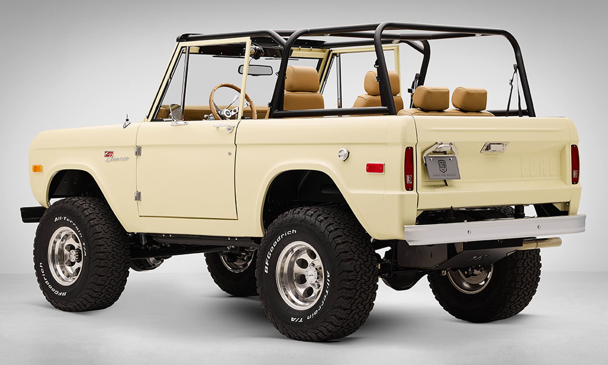 1966 Yellow Classic Ford Bronco Coyote Series with Straw custom interior and family roll cage