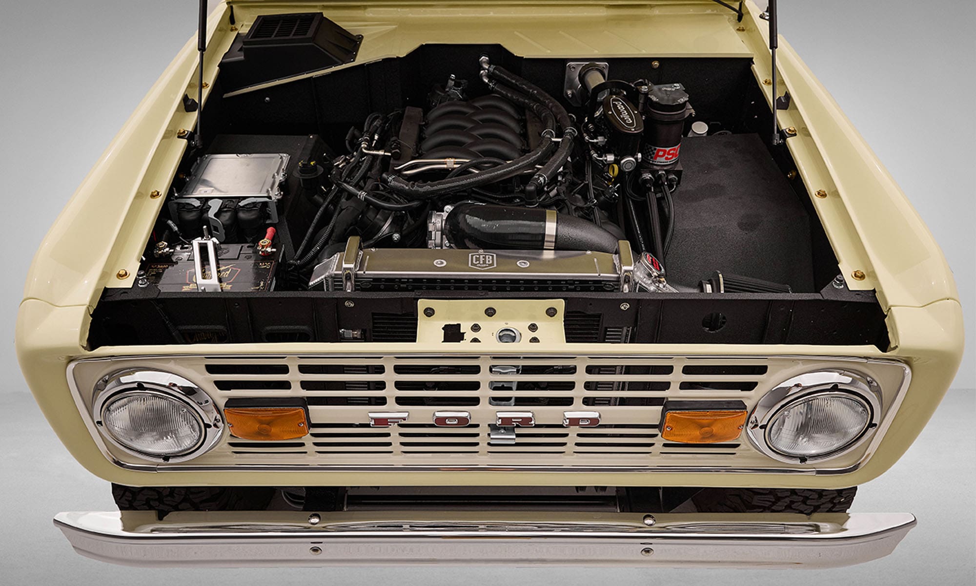 1966 Yellow Classic Ford Bronco Coyote Series with Straw custom interior and family roll cage