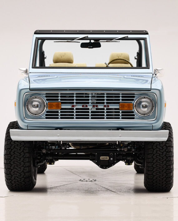 1966 Brittany Blue Classic Ford Bronco with color matched grille and chrome factory bumpers
