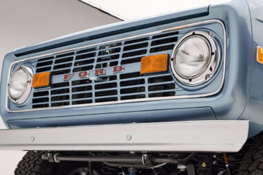 1966 Brittany Blue Classic Ford Bronco with custom diamond stitch interior and color matched grille