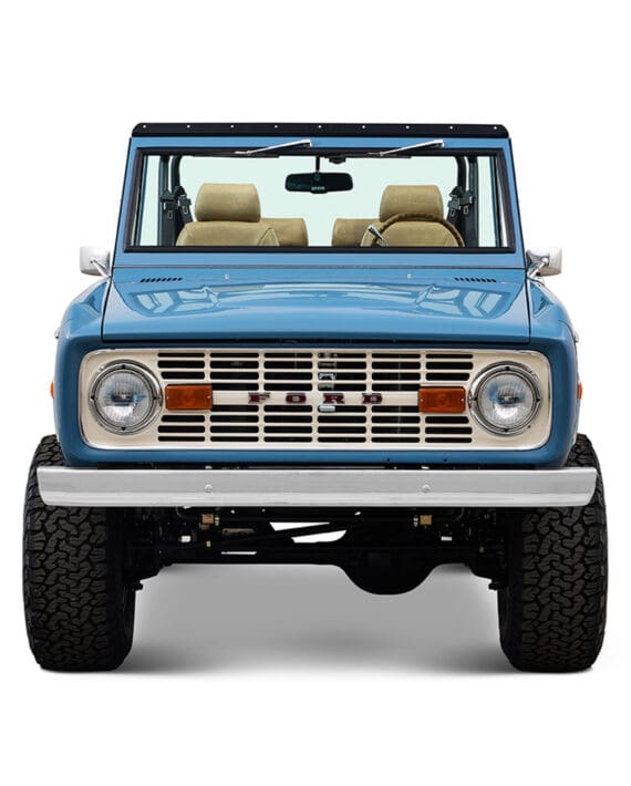 1970 Ford Bronco in Stars and Stripes Blue with family roll cage and Wimbledon white grille