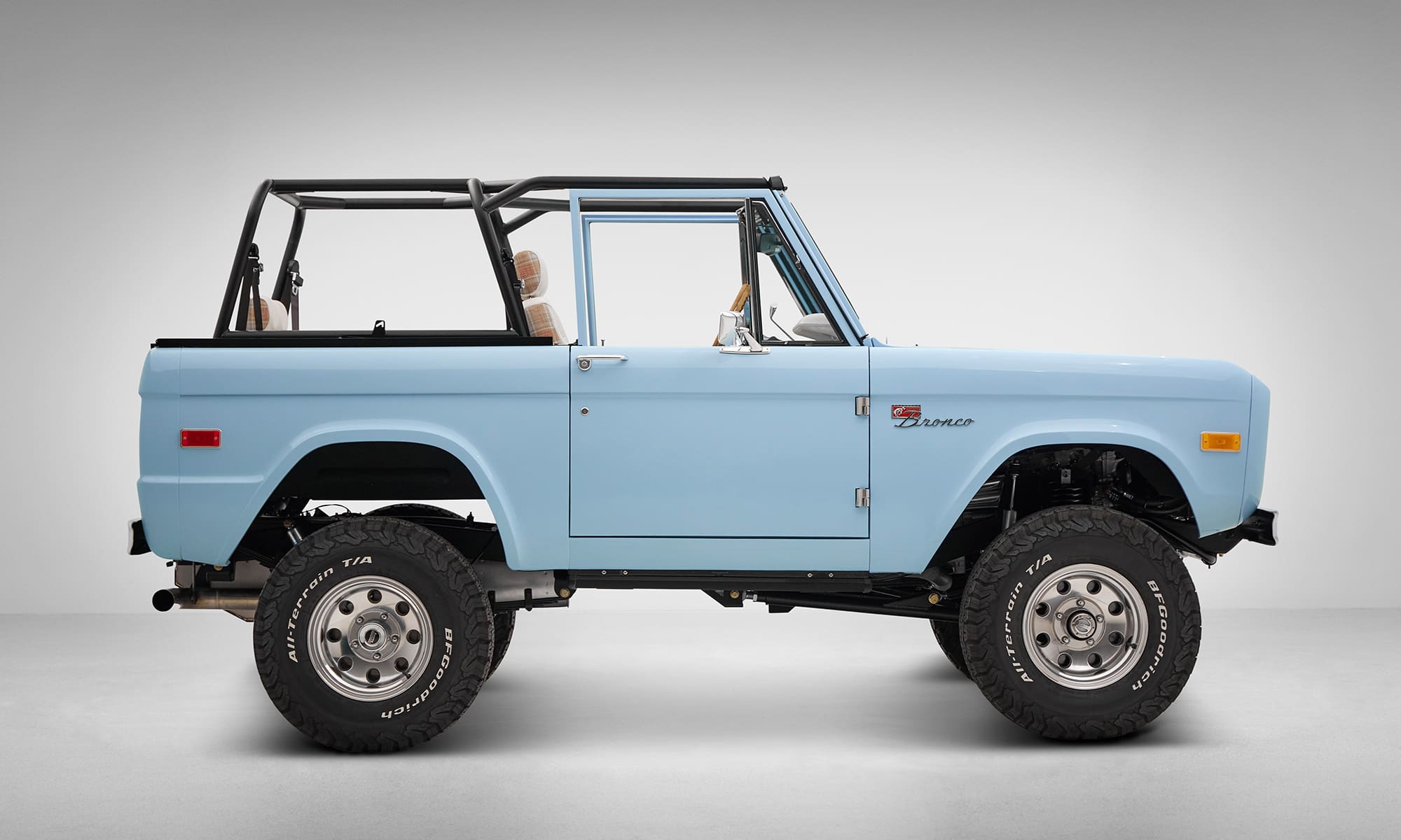 A 1970 Classic Ford Broncos coyote series in frozen blue over custom white rock leather interior profile