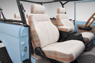 A 1970 Classic Ford Broncos coyote series in frozen blue over custom white rock leather with tartan plaid interior and family cage 2