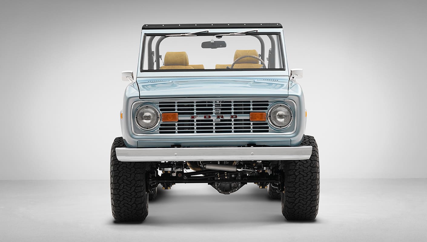 1975 ford bronco painted brittany blue with cowboy debossed, baseball stitch leather front profile