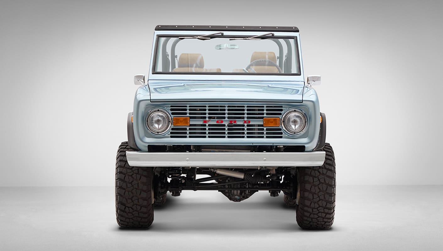1976 Ford Bronco in Brittany Blue with whiskey diamond stitch front