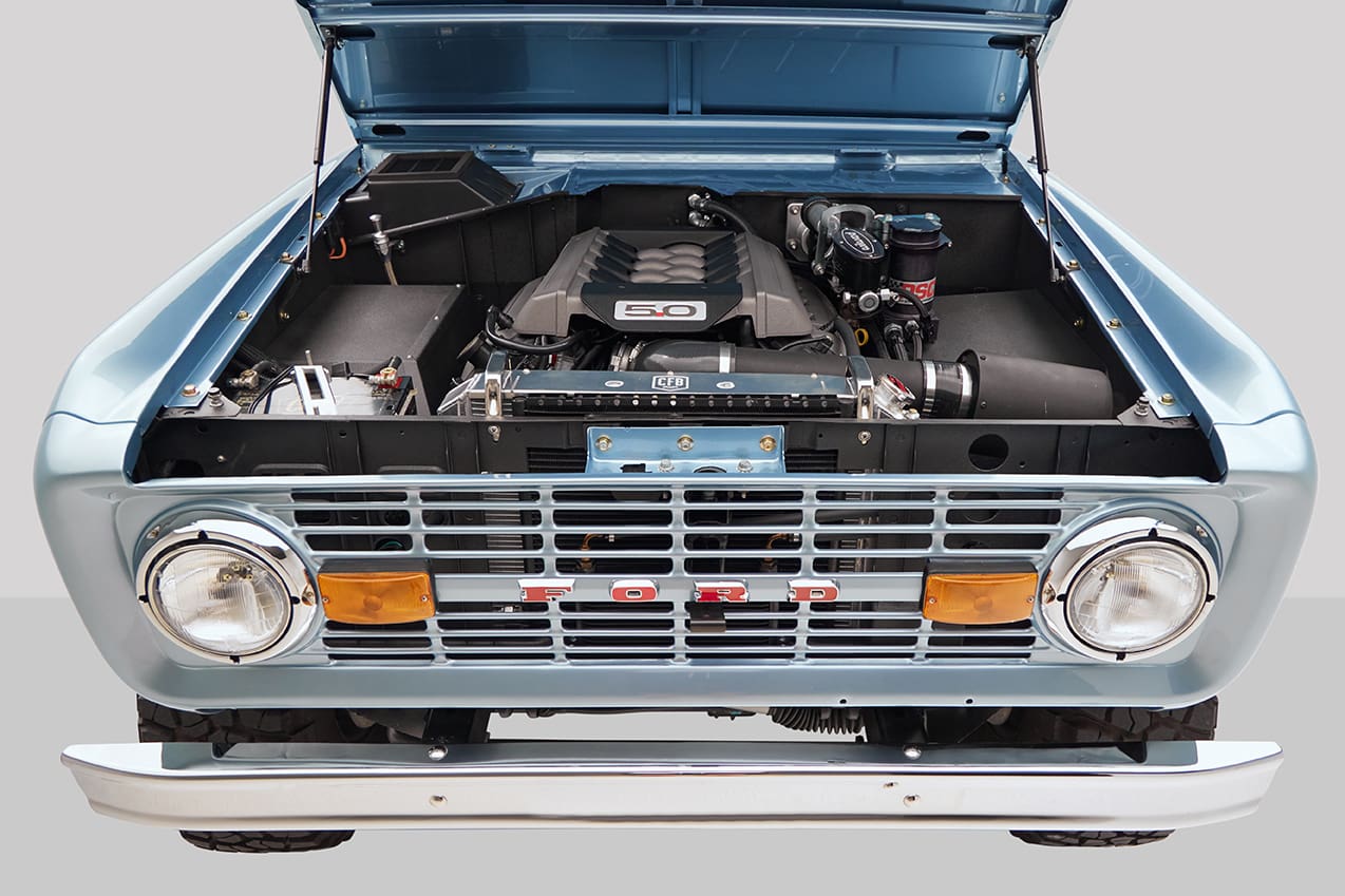 1976 Ford Bronco in Brittany Blue with ford racing coyote 3rd gen motor