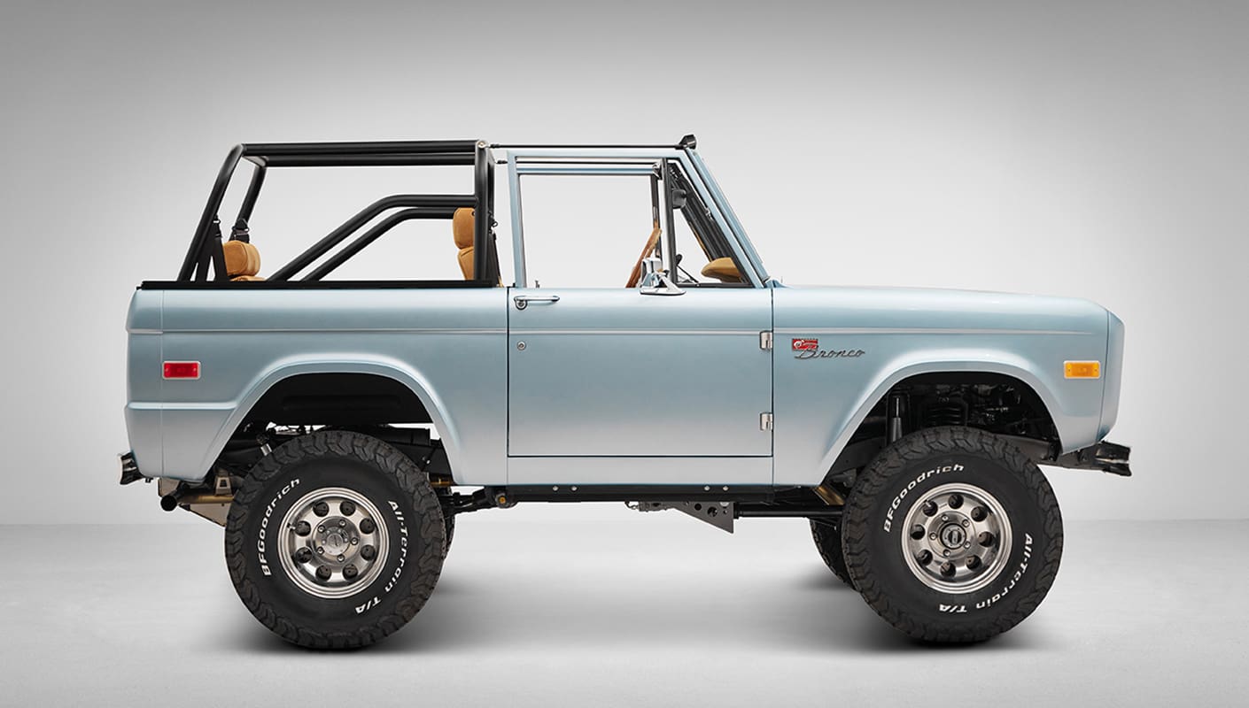 1975 ford bronco painted brittany blue with cowboy debossed, baseball stitch leather passenger profile