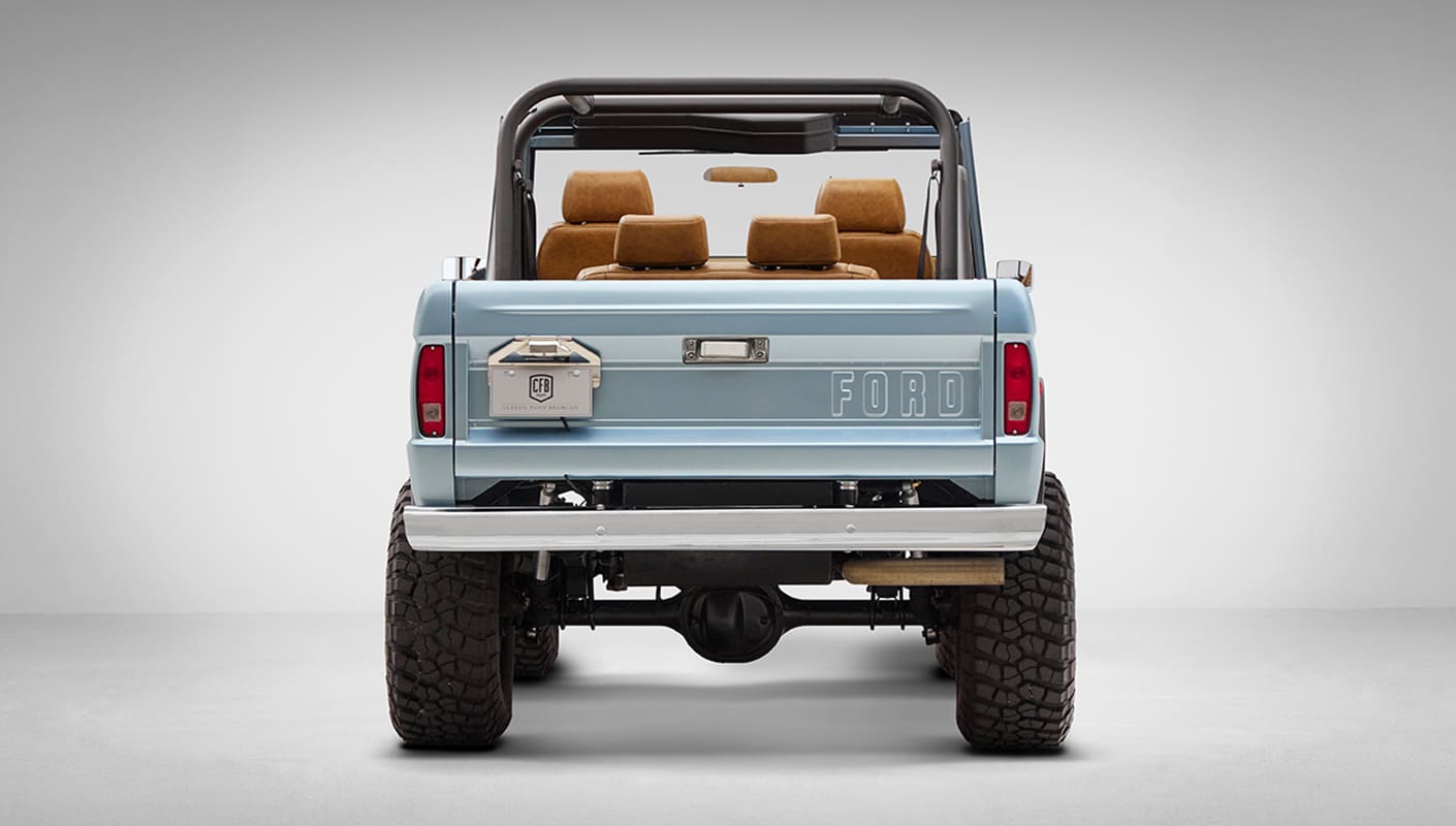 1976 Ford Bronco in Brittany Blue with whiskey diamond stitch rear