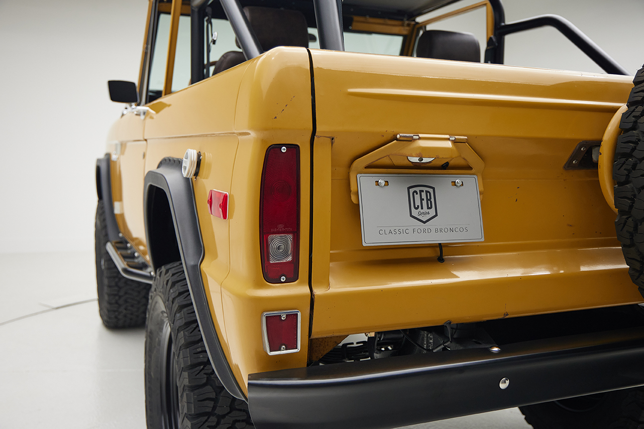 1966 classic ford bronco in goldenrod patina paint rear license plate