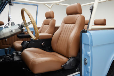 1967 Classic Ford Bronco painted in Frozen Blue over Ball Glove leather interior drivers seat