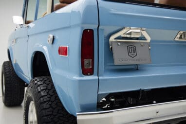 1967 Classic Ford Bronco painted in Frozen Blue over Ball Glove leather interior license plate