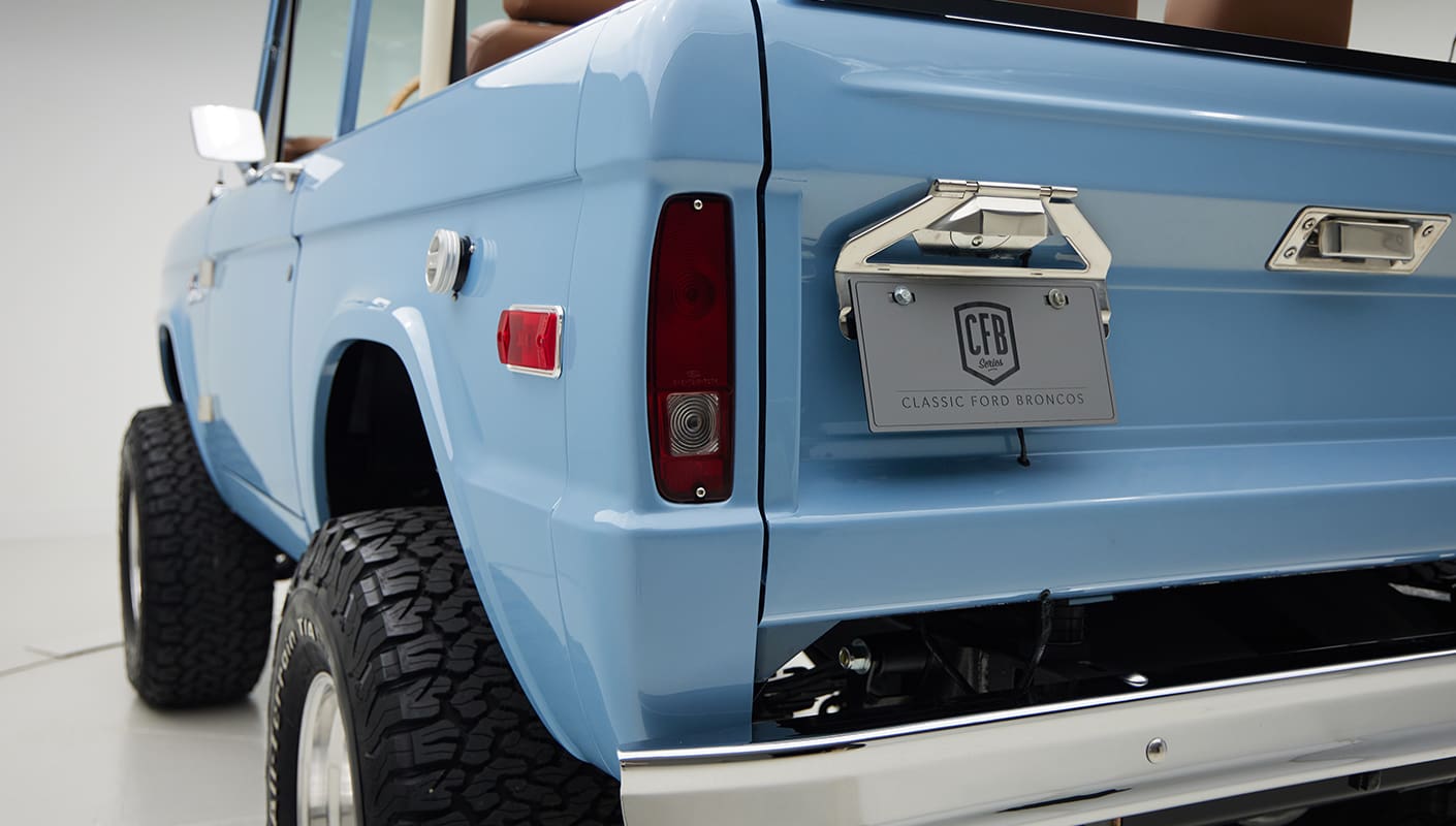 1967 Classic Ford Bronco painted in Frozen Blue over Ball Glove leather interior license plate
