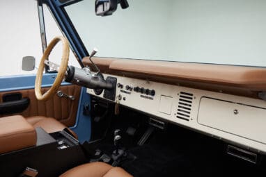 1967 Classic Ford Bronco painted in Frozen Blue over Ball Glove leather interior passenger dash