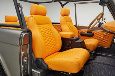 1972 classic ford bronco in matte silver with orange leather interior passenger seat