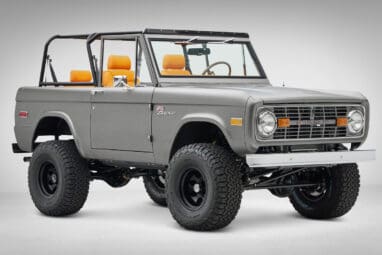 1972 Classic Ford Bronco in Matte Silver over Orange Leather interior front passenger 3/4