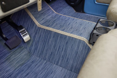 A 1976 Classic Ford Bronco is Frozen Blue over White Rock leather with custom carpet kit