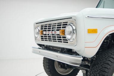 1973 classic ford bronco in diamond blue with butterscotch leather interior, vintage decals and chrome trim grill