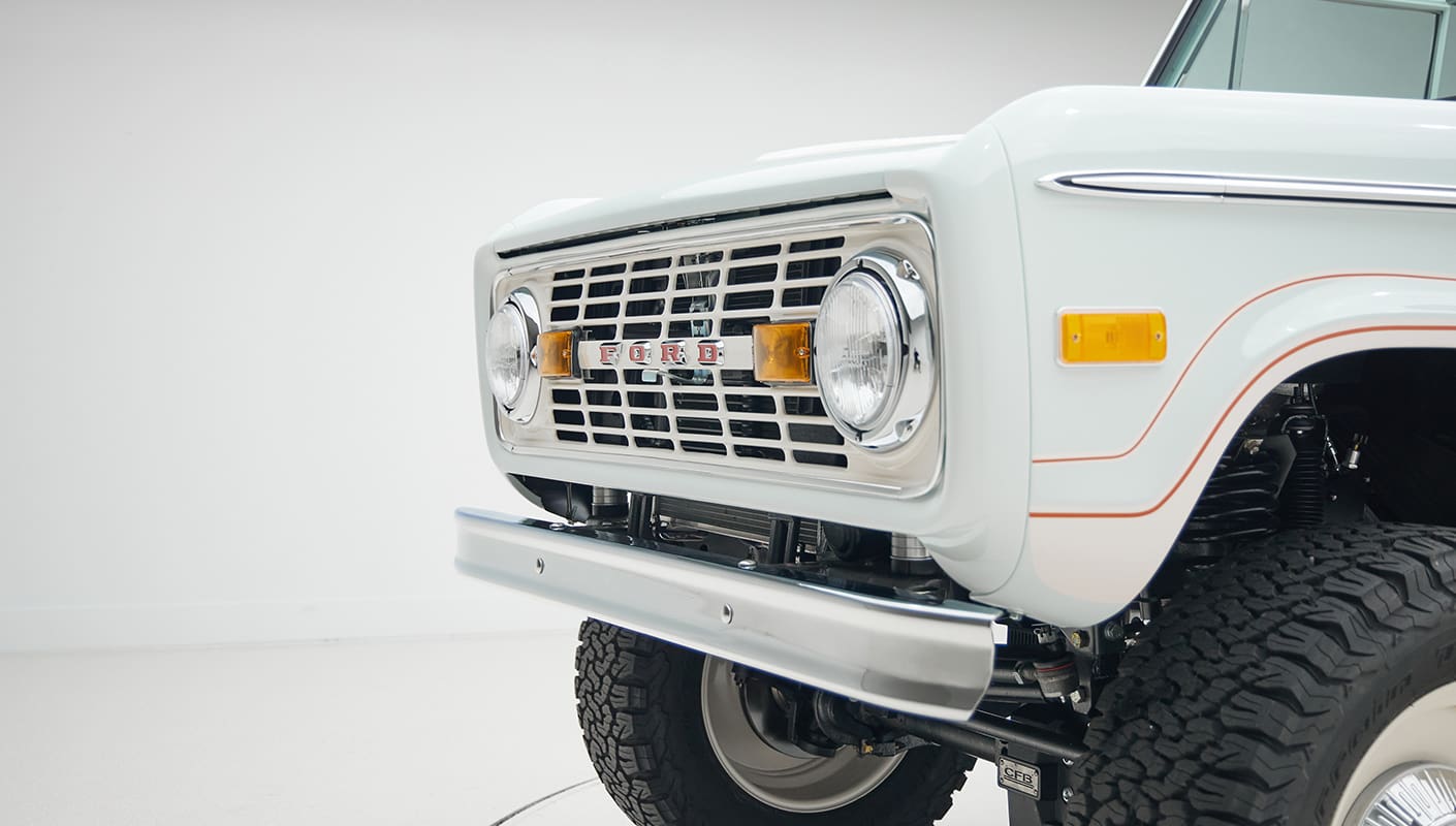 1973 classic ford bronco in diamond blue with butterscotch leather interior, vintage decals and chrome trim grill