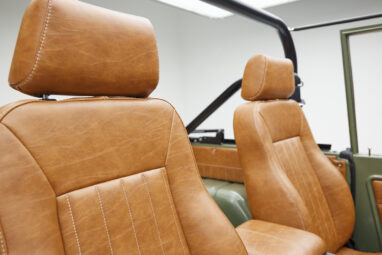 1976 classic ford bronco in boxwood green with ball glove leather leather detail