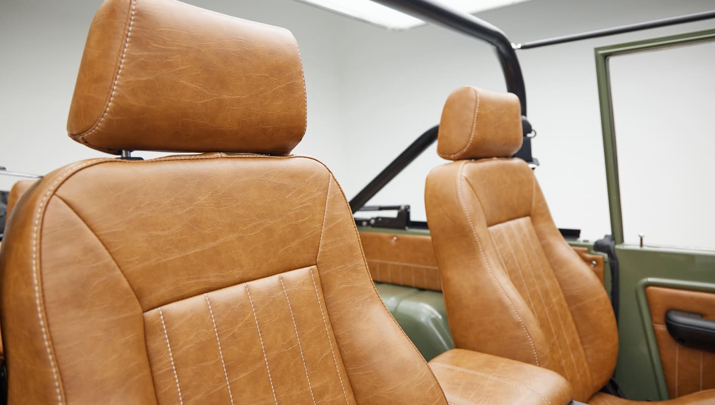 1976 classic ford bronco in boxwood green with ball glove leather leather detail