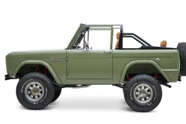 1976 classic ford bronco in boxwood green with ball glove leather driver profile