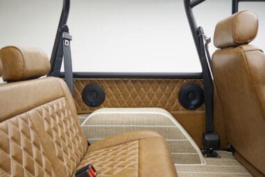 1966 ford bronco in highland green with whiskey leather interior rear speakers