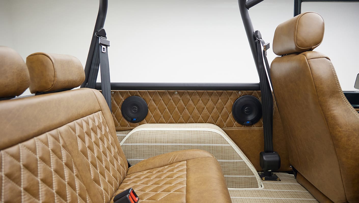 1966 ford bronco in highland green with whiskey leather interior rear speakers