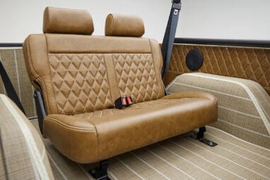1966 ford bronco in highland green with whiskey leather interior rear seat