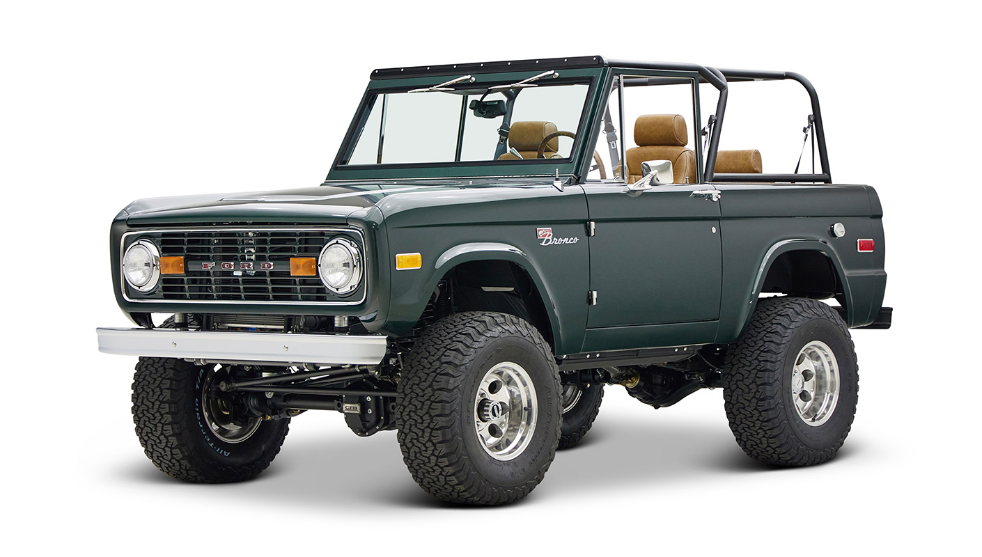 1966 ford bronco in highland green with whiskey leather interior front driver angle
