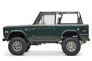 1966 ford bronco in highland green with whiskey leather interior driver profile