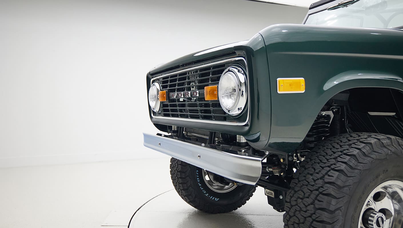1966 ford bronco in highland green with whiskey leather interior grill