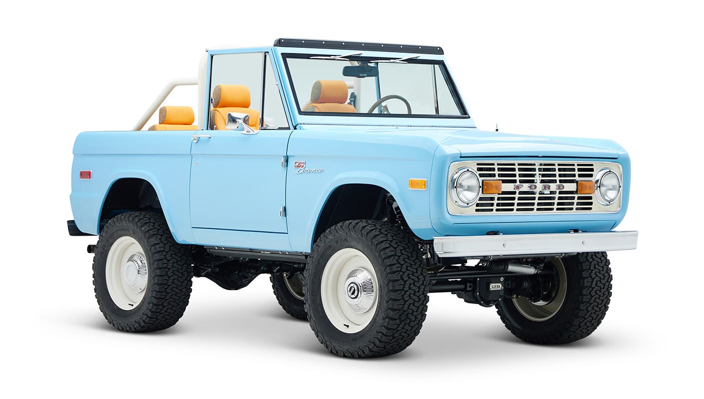 1973 Classic Ford Bronco in frozen blue with rolls royce orange leather and alpaca interior front passenger