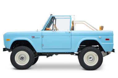 1973 Classic Ford Bronco in frozen blue with rolls royce orange leather and alpaca interior driver profile