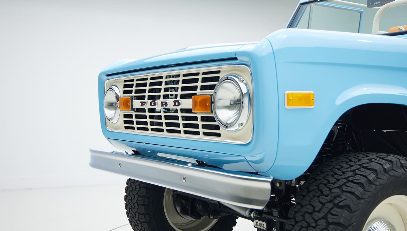 1973 Classic Ford Bronco in frozen blue with rolls royce orange leather and alpaca interior grill