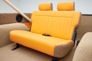 1973 Classic Ford Bronco in frozen blue with rolls royce orange leather and alpaca interior rear seat