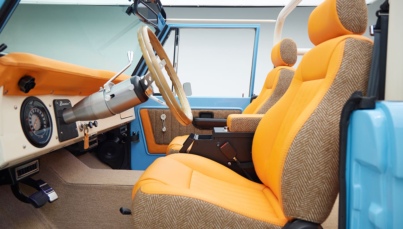 1973 Classic Ford Bronco in frozen blue with rolls royce orange leather and alpaca interior interior detail