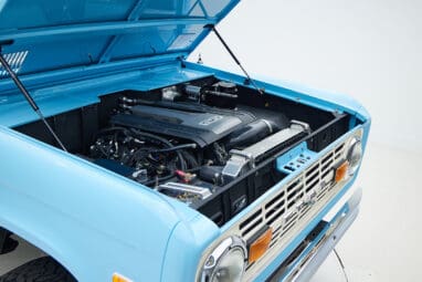 1973 Classic Ford Bronco in frozen blue with rolls royce orange leather and alpaca interior passenger motor