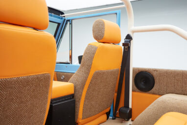 1973 Classic Ford Bronco in frozen blue with rolls royce orange leather and alpaca interior seat detail