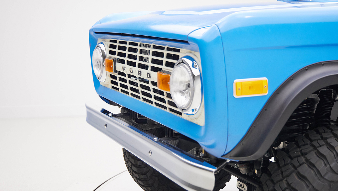 1976 classic ford bronco in blue patina paint with whiskey leather interior grill