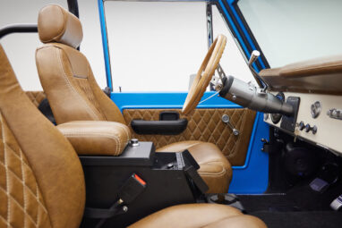 1976 classic ford bronco in blue patina paint with whiskey leather interior passenger interior profile