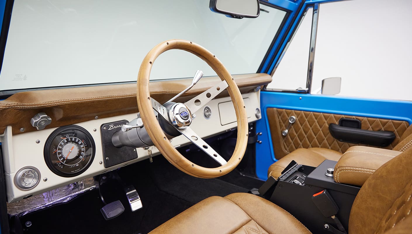 1976 classic ford bronco in blue patina paint with whiskey leather interior wood steering wheel