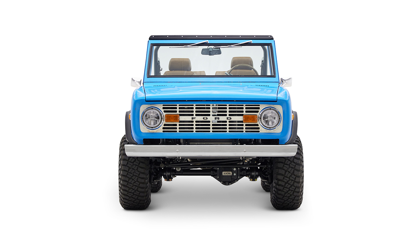 1976 classic ford bronco in blue patina paint with whiskey leather interior front