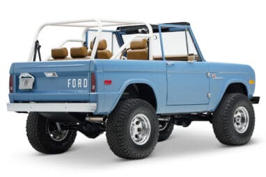 1974 classic ford bronco in stars & stripes blue with whiskey leather rear passenger